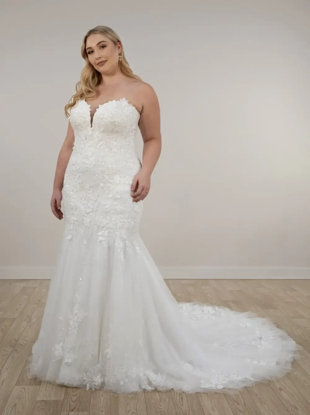 Photo of Model wearing a Blush Bridal Salon Plus Size Collection Gown
