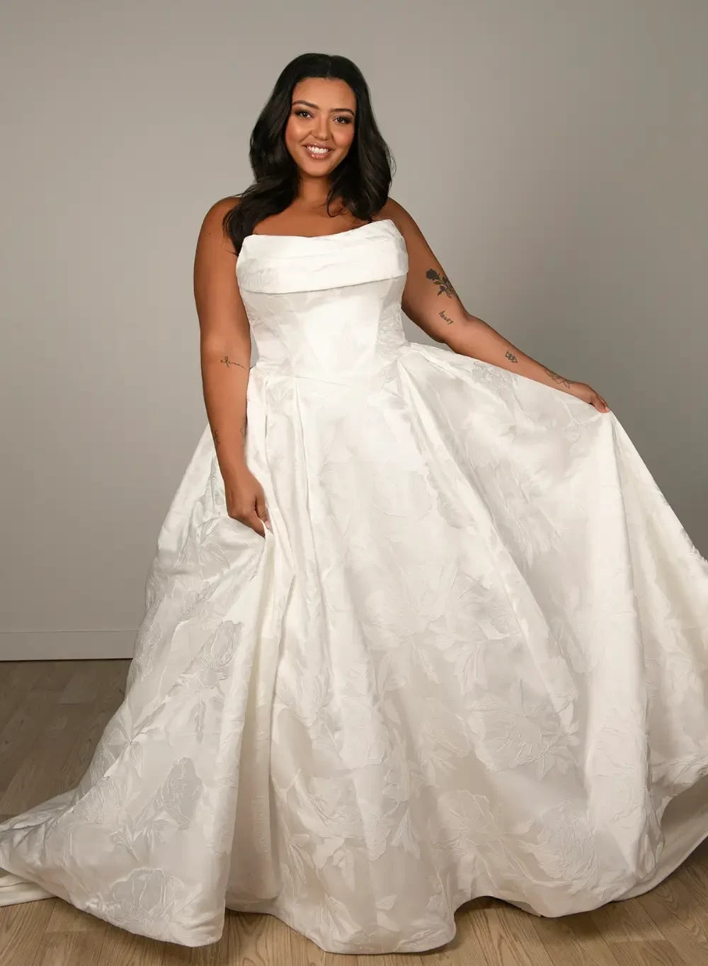 Photo of Model wearing a Blush Bridal Salon Plus Size Collection Gown