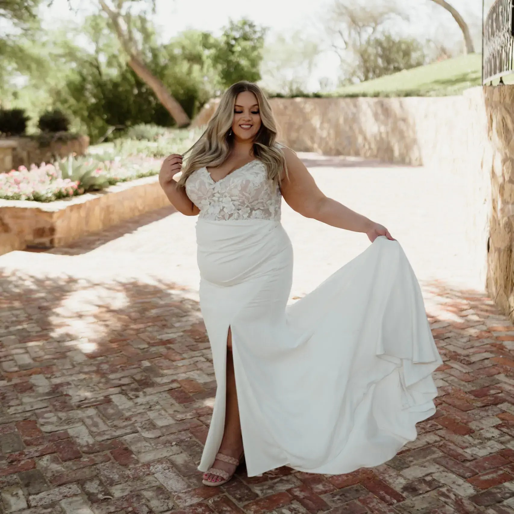 Photo of Model wearing a Blush Bridal Salon Plus Size Collection Gown