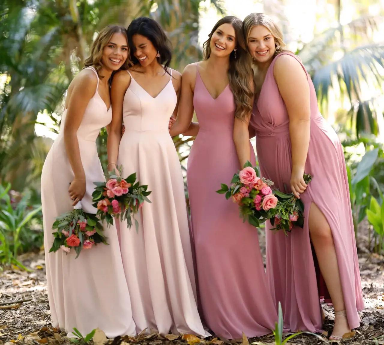 Photo of Models wearing Blush Bridal Salon Bridesmaids Collection Gowns
